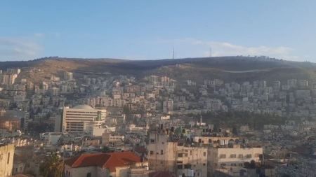 اشتباك في نابلس وحملة اعتقالات بالضفة والقدس